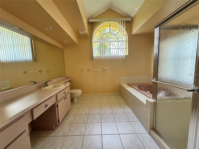 full bathroom featuring a garden tub, toilet, tile patterned flooring, vaulted ceiling, and vanity