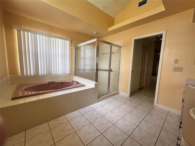 full bath with visible vents, a shower stall, tile patterned flooring, a garden tub, and vanity