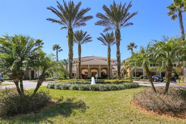 2115 N Halcyon Dr Unit 510, Sun City Center, FL 33573 - mediterranean / spanish home featuring stucco siding and a front yard