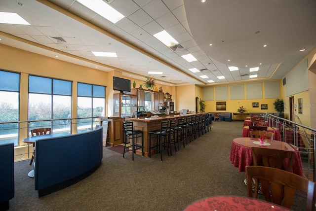 2115 N Halcyon Dr Unit 510, Sun City Center, FL 33573 - dining room featuring carpet floors, a paneled ceiling, and recessed lighting