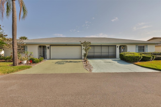 2115 N Halcyon Dr Unit 510, Sun City Center, FL 33573 - single story home with stucco siding, a garage, driveway, and roof with shingles