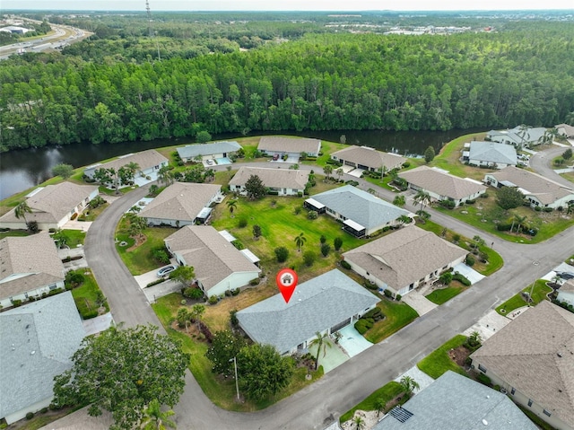 2115 N Halcyon Dr Unit 510, Sun City Center, FL 33573 - view of property location featuring a heavily wooded area, a nearby body of water, and nearby suburban area