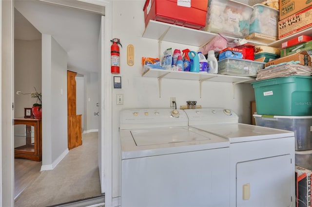 2115 N Halcyon Dr Unit 510, Sun City Center, FL 33573 - laundry area featuring washer and dryer and baseboards
