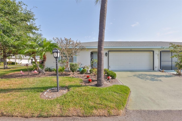 2115 N Halcyon Dr Unit 510, Sun City Center, FL 33573 - ranch-style home with stucco siding, an attached garage, concrete driveway, and a front yard