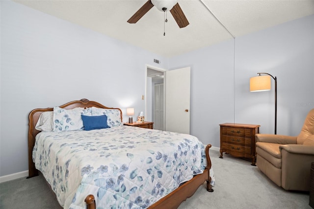 7701 Starkey Rd Unit 443, Seminole, FL 33777 - bedroom featuring light carpet, baseboards, and ceiling fan