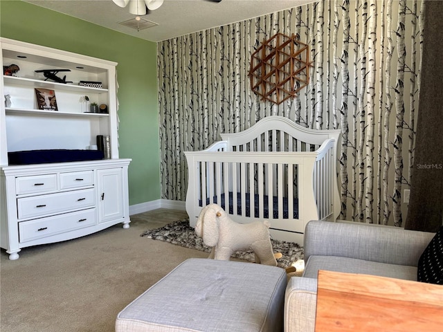 4407 Scarlet Loop, Wesley Chapel, FL 33544 - carpeted bedroom with baseboards and a nursery area