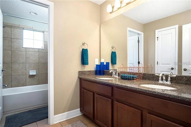 4407 Scarlet Loop, Wesley Chapel, FL 33544 - bathroom featuring double vanity, tile patterned floors, shower / washtub combination, and baseboards