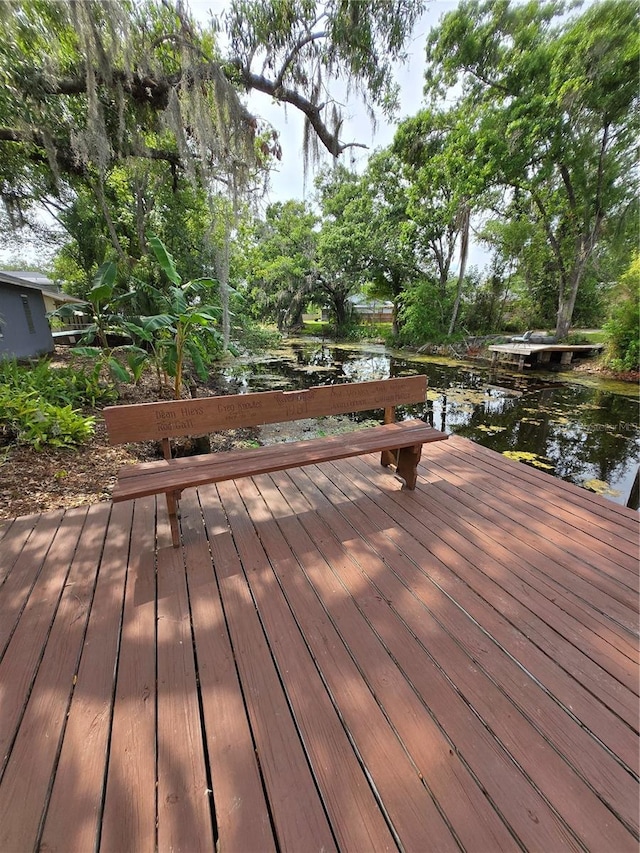 deck featuring a water view