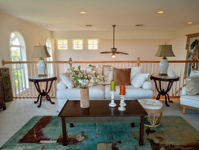 6926 Mccray Dr, Hudson, FL 34667 - carpeted living area with ceiling fan