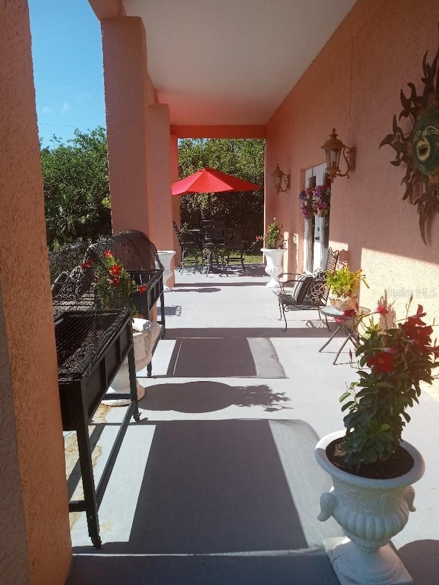 6926 Mccray Dr, Hudson, FL 34667 - view of patio / terrace with outdoor dining area