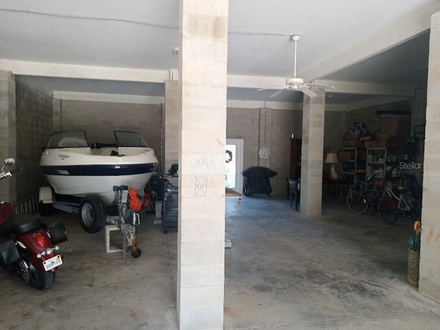 6926 Mccray Dr, Hudson, FL 34667 - garage featuring a ceiling fan