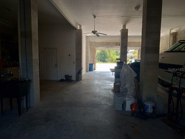 6926 Mccray Dr, Hudson, FL 34667 - garage with a ceiling fan