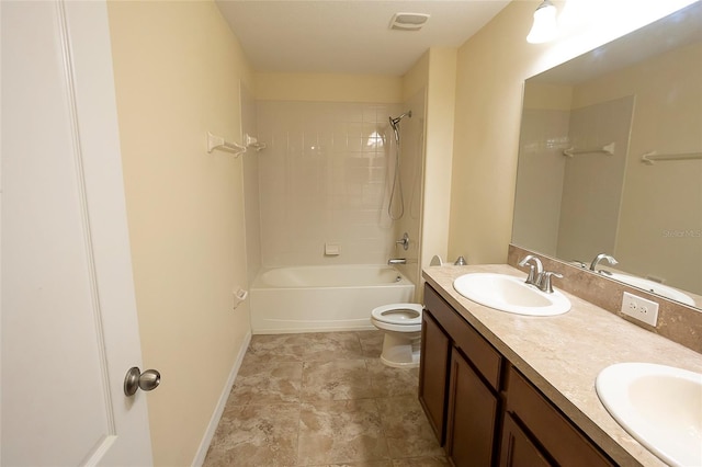 621 Washita Stone Dr, Ruskin, FL 33570 - bathroom featuring toilet,  shower combination, double vanity, and a sink