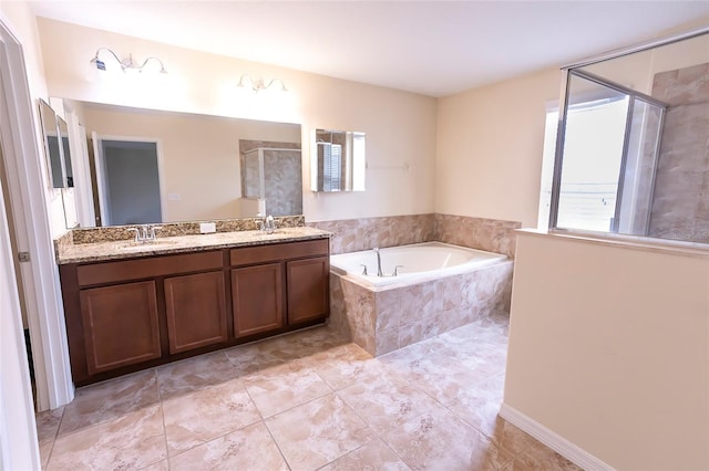 621 Washita Stone Dr, Ruskin, FL 33570 - full bath with a stall shower, a bath, plenty of natural light, and a sink