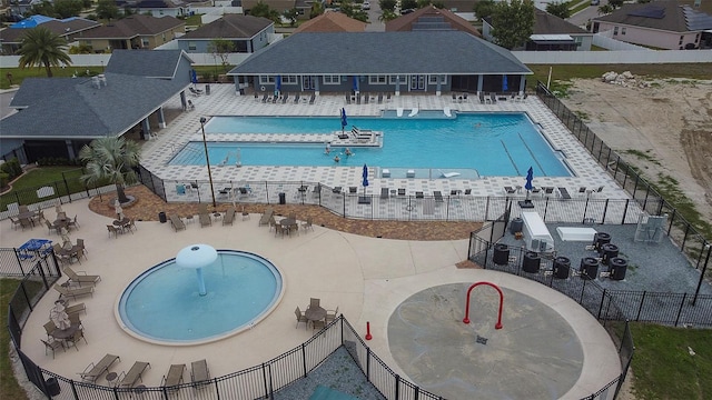 621 Washita Stone Dr, Ruskin, FL 33570 - pool featuring a patio area and fence