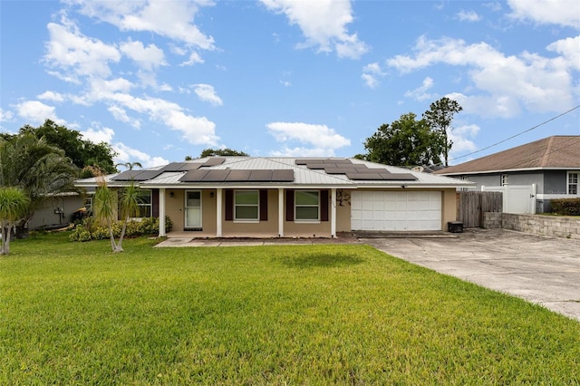 view of front facade featuring an attached garage, stucco siding, concrete driveway, solar panels, and a porch