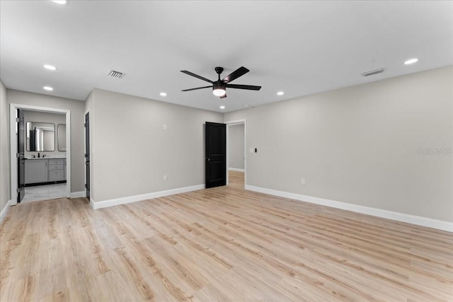 3215 E Powhatan Ave, Tampa, FL 33610 - unfurnished living room with recessed lighting, a ceiling fan, light wood-style floors, and baseboards