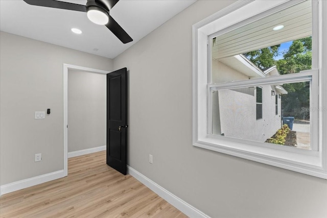 3215 E Powhatan Ave, Tampa, FL 33610 - unfurnished bedroom featuring wood finished floors, baseboards, a ceiling fan, and recessed lighting