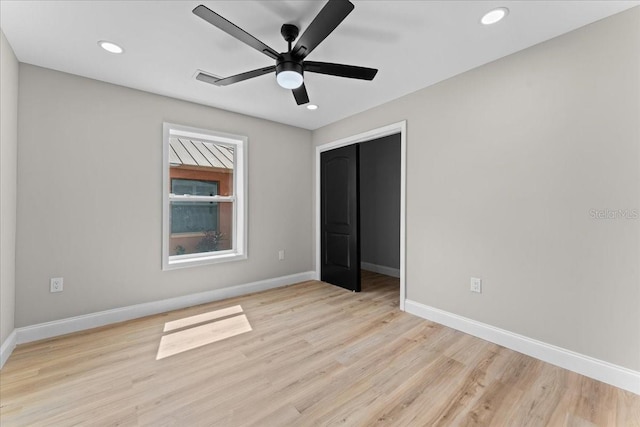 3215 E Powhatan Ave, Tampa, FL 33610 - unfurnished bedroom with baseboards, wood finished floors, recessed lighting, and ceiling fan
