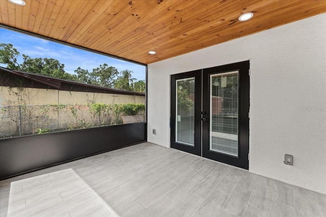 3215 E Powhatan Ave, Tampa, FL 33610 - view of patio featuring french doors