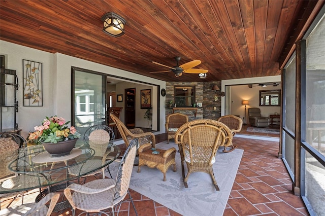 sunroom featuring healthy amount of natural light