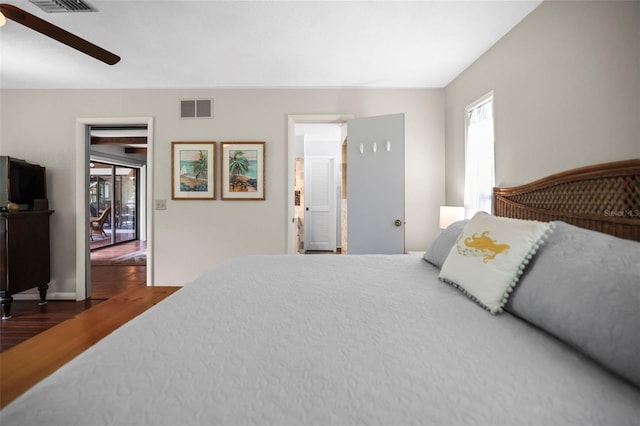bedroom featuring wood finished floors and a ceiling fan