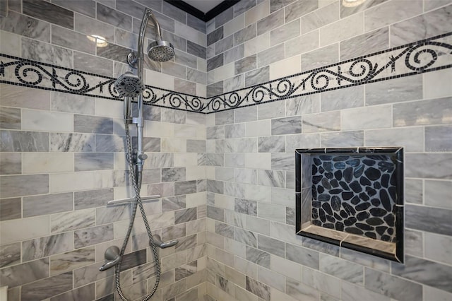 full bath with tiled shower