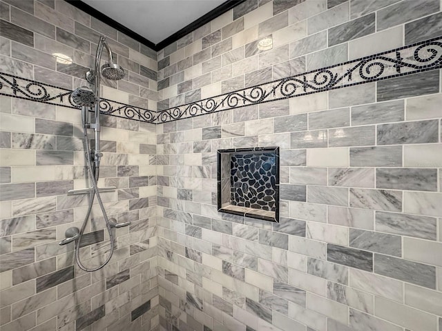 full bathroom featuring tiled shower