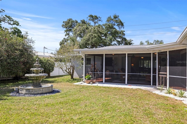 view of yard with a sunroom