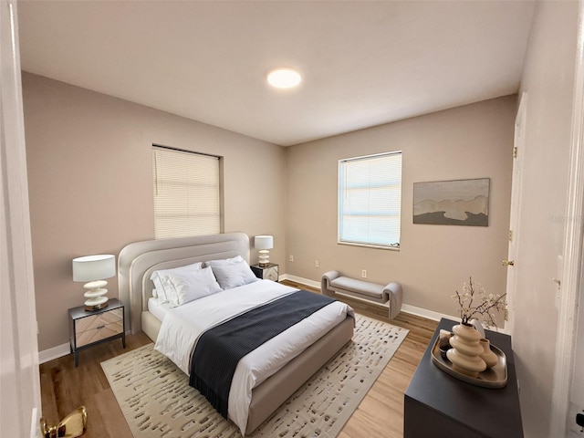 2201 Flamingo Ave, Deltona, FL 32738 - bedroom with baseboards and light wood finished floors