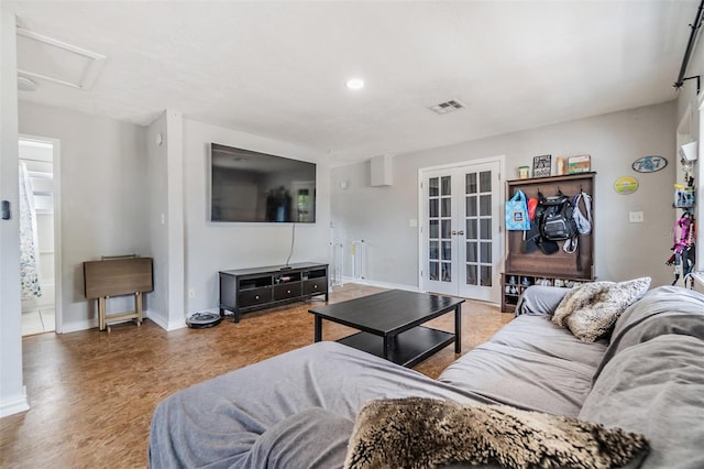 6816 13th St N, Saint Petersburg, FL 33702 - living area featuring french doors, baseboards, attic access, and recessed lighting