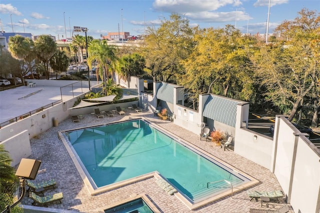 pool with a patio area