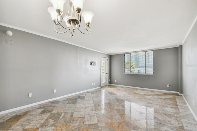 spare room featuring baseboards, marble finish floor, a notable chandelier, and crown molding
