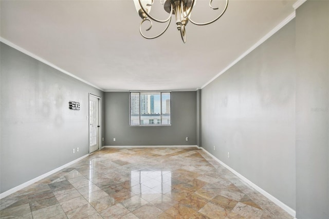 unfurnished room featuring baseboards, a chandelier, and crown molding