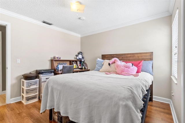 3823 N Oak Dr Unit K22, Tampa, FL 33611 - bedroom with crown molding and wood finished floors