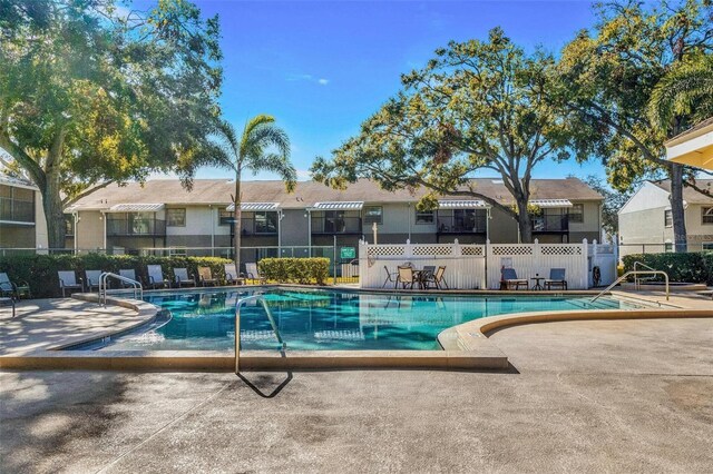 3823 N Oak Dr Unit K22, Tampa, FL 33611 - pool with a patio and fence