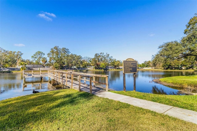 3823 N Oak Dr Unit K22, Tampa, FL 33611 - dock area with a yard and a water view