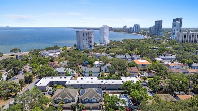 view of urban area featuring a nearby body of water
