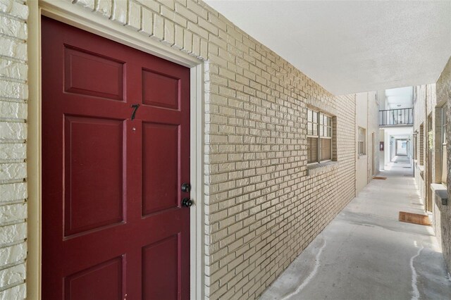 2207 S Carolina Ave Unit 7, Tampa, FL 33629 - view of exterior entry featuring brick siding