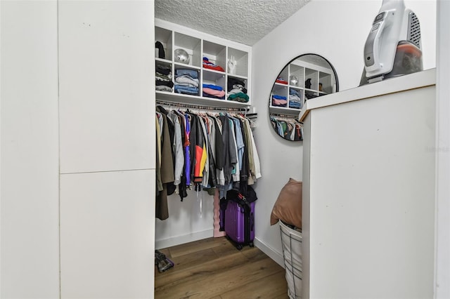 500 Treasure Island Cswy Unit 607, Treasure Island, FL 33706 - spacious closet featuring wood finished floors