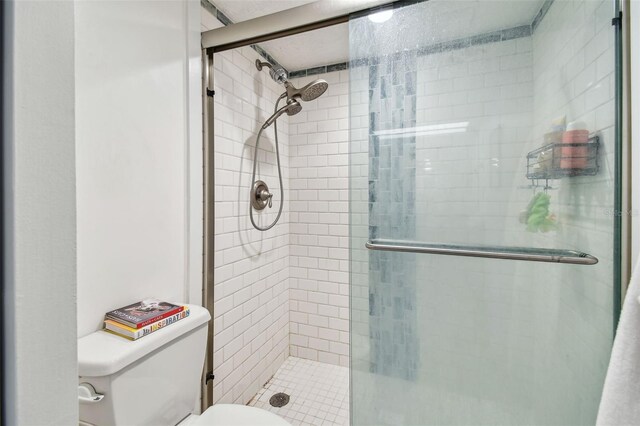 500 Treasure Island Cswy Unit 607, Treasure Island, FL 33706 - full bathroom with toilet and a shower stall