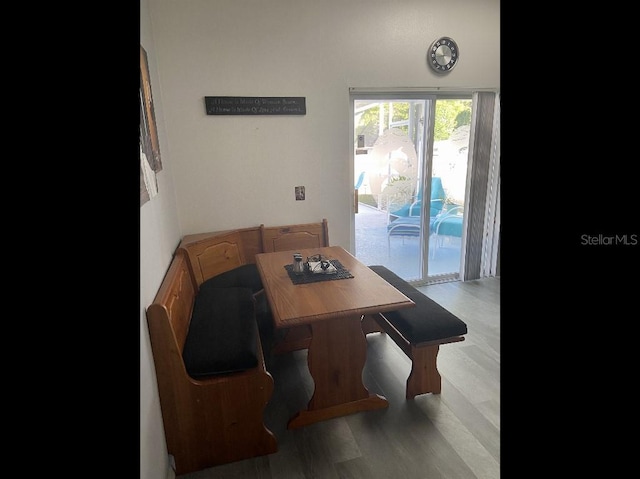 dining space featuring light wood-style flooring