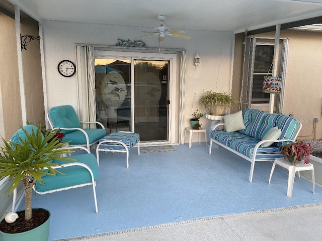 view of patio featuring ceiling fan