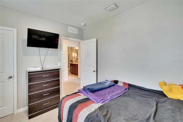 bedroom with carpet and baseboards