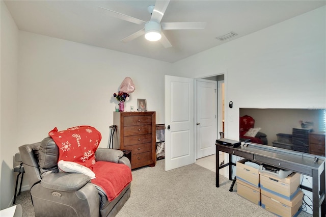 sitting room featuring carpet floors and a ceiling fan