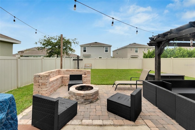 view of patio with an outdoor fire pit