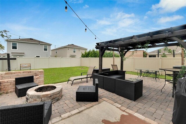view of patio / terrace featuring a pergola and an outdoor living space with a fire pit