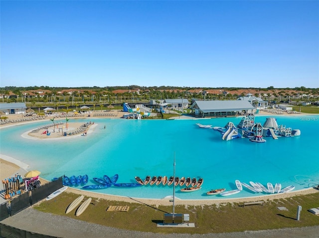 drone / aerial view of a pool area