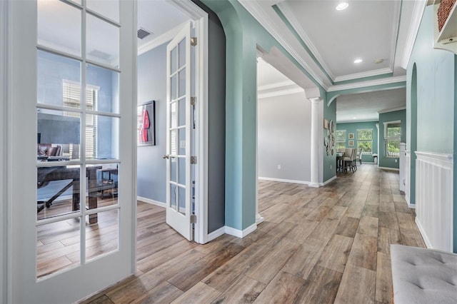 4094 Windcrest Dr, Wesley Chapel, FL 33544 - corridor featuring crown molding, wood finished floors, baseboards, and ornate columns