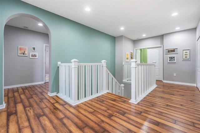 4094 Windcrest Dr, Wesley Chapel, FL 33544 - hallway featuring baseboards, an upstairs landing, recessed lighting, and wood finished floors